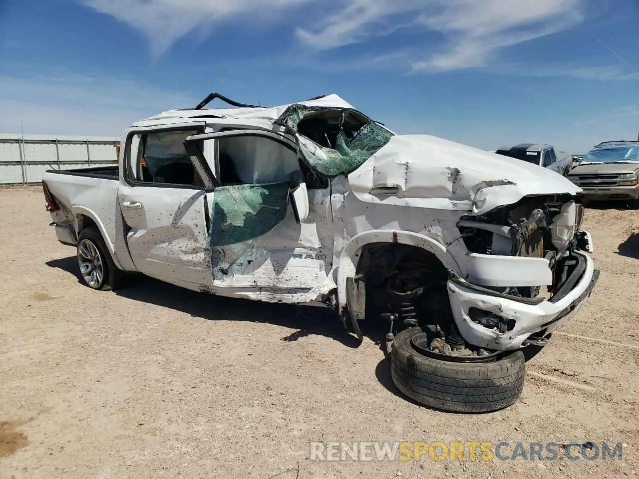4 Photograph of a damaged car 1C6SRFJT9MN642999 RAM 1500 2021