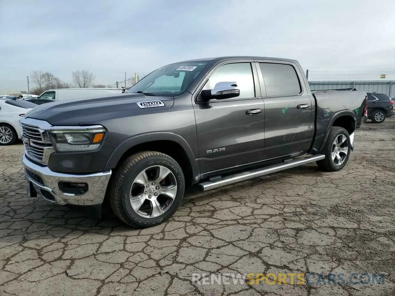 1 Photograph of a damaged car 1C6SRFJT9MN671807 RAM 1500 2021