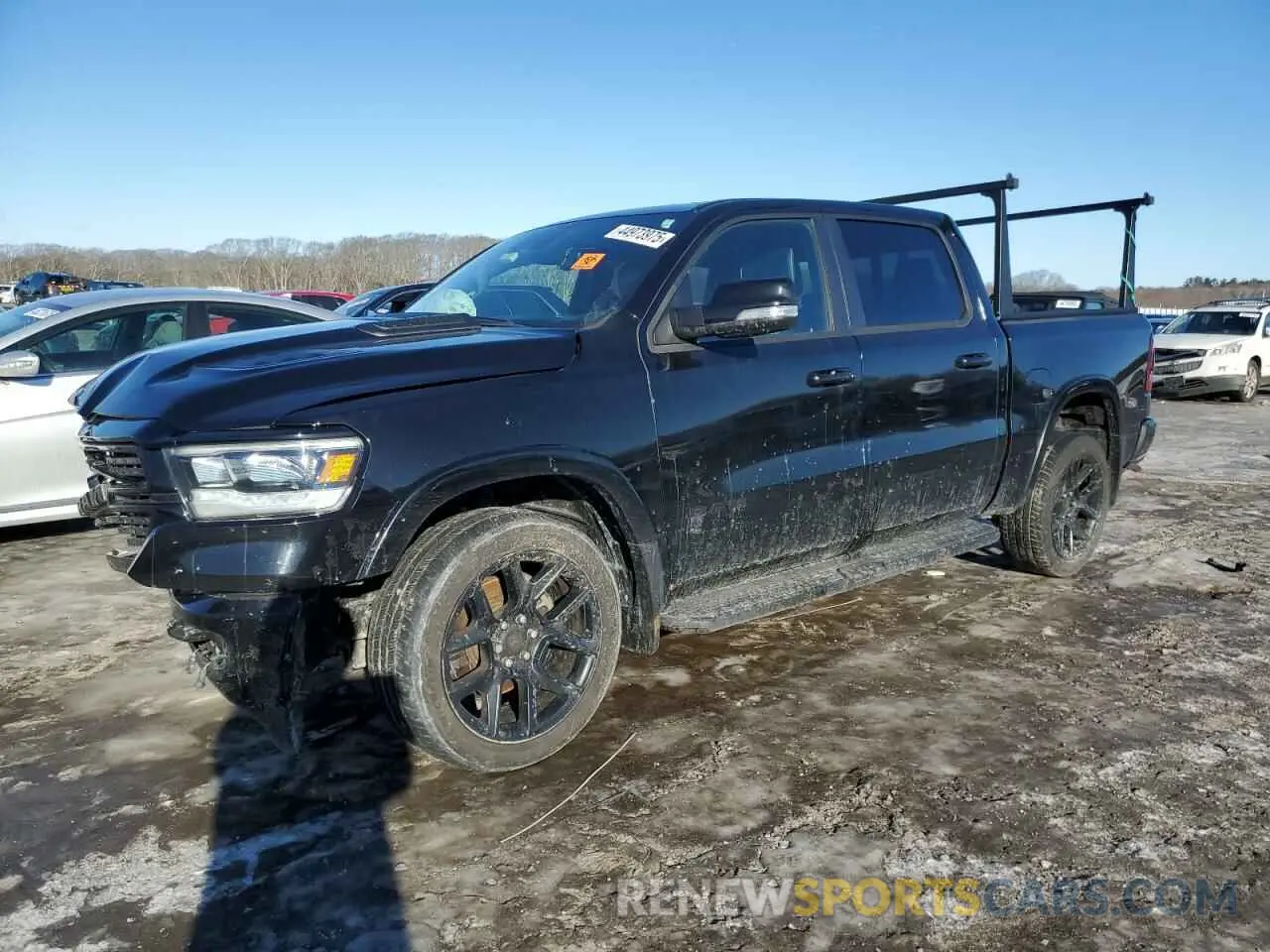 1 Photograph of a damaged car 1C6SRFJTXMN577760 RAM 1500 2021