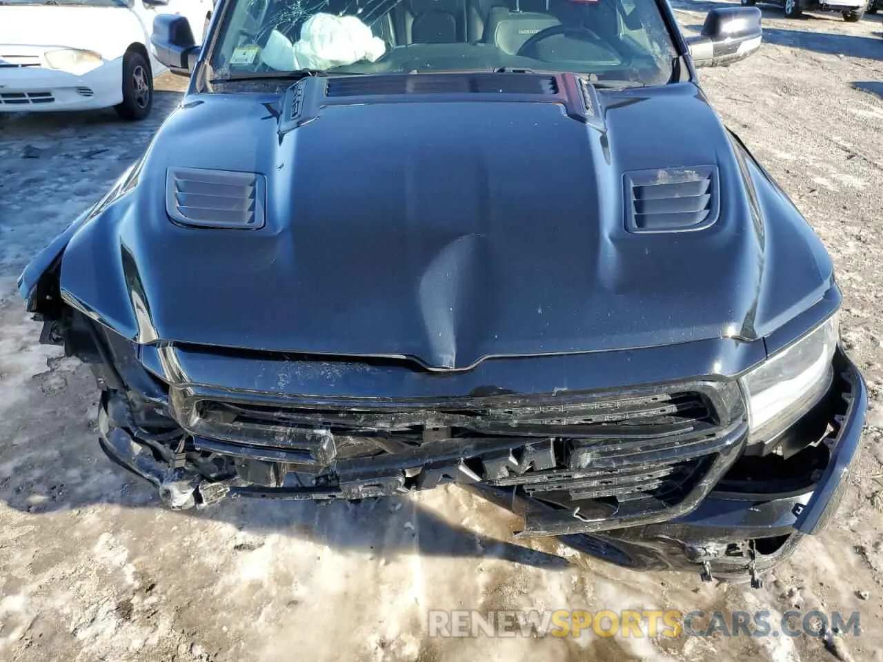 11 Photograph of a damaged car 1C6SRFJTXMN577760 RAM 1500 2021