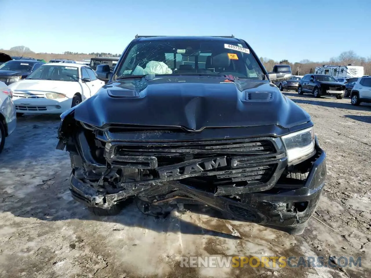 5 Photograph of a damaged car 1C6SRFJTXMN577760 RAM 1500 2021