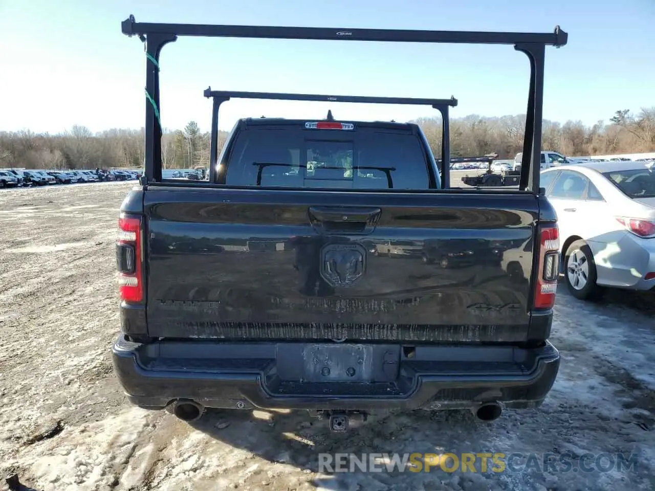 6 Photograph of a damaged car 1C6SRFJTXMN577760 RAM 1500 2021