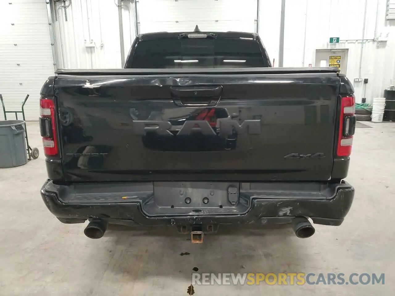 6 Photograph of a damaged car 1C6SRFJTXMN634443 RAM 1500 2021
