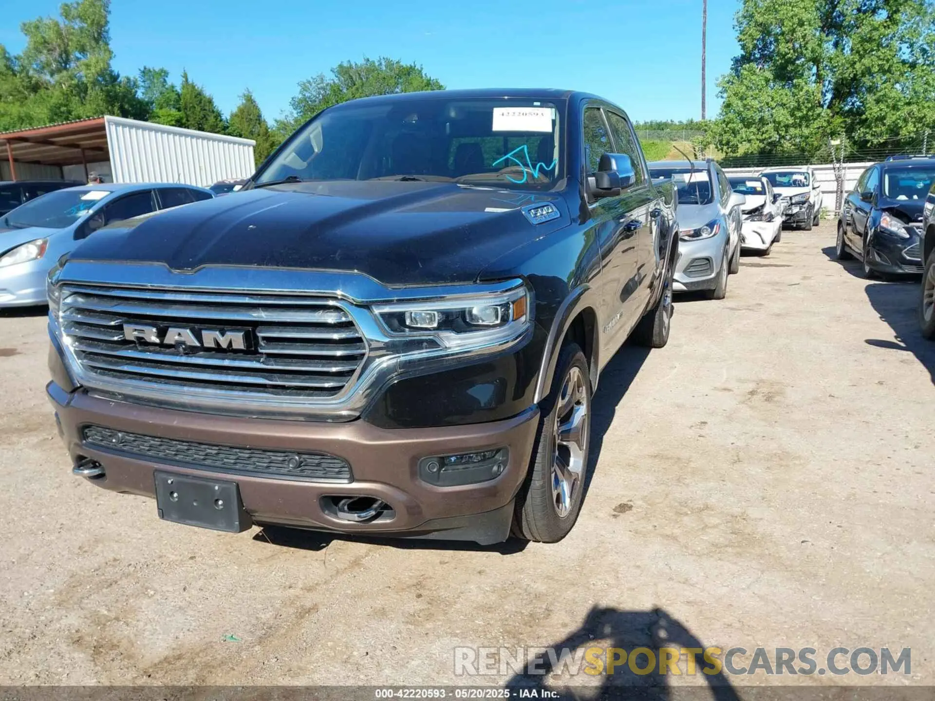 2 Photograph of a damaged car 1C6SRFKT7MN664062 RAM 1500 2021