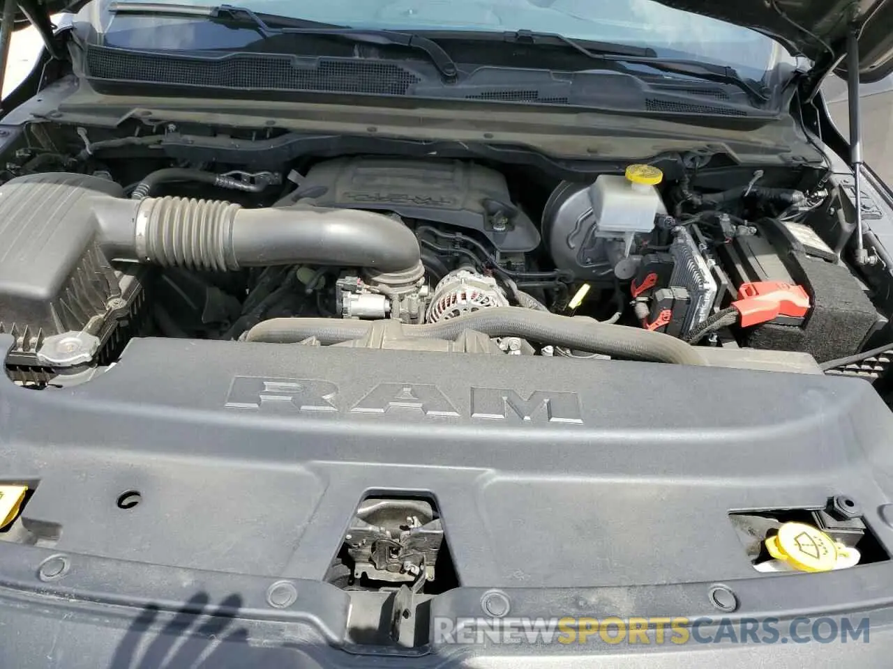 12 Photograph of a damaged car 1C6SRFLT0MN559961 RAM 1500 2021