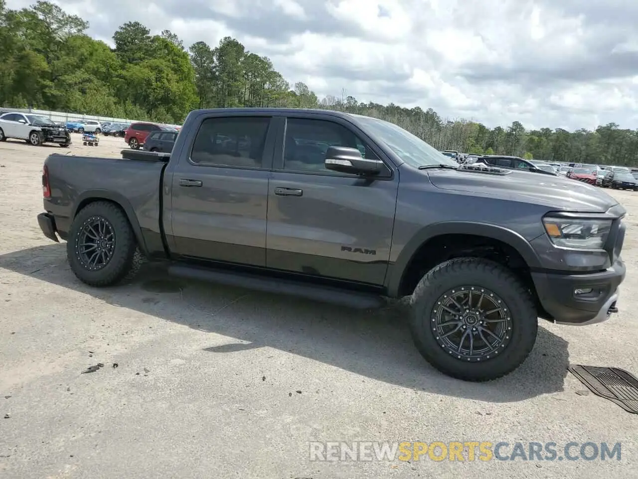 4 Photograph of a damaged car 1C6SRFLT0MN559961 RAM 1500 2021