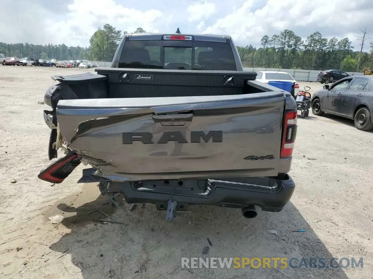6 Photograph of a damaged car 1C6SRFLT0MN559961 RAM 1500 2021