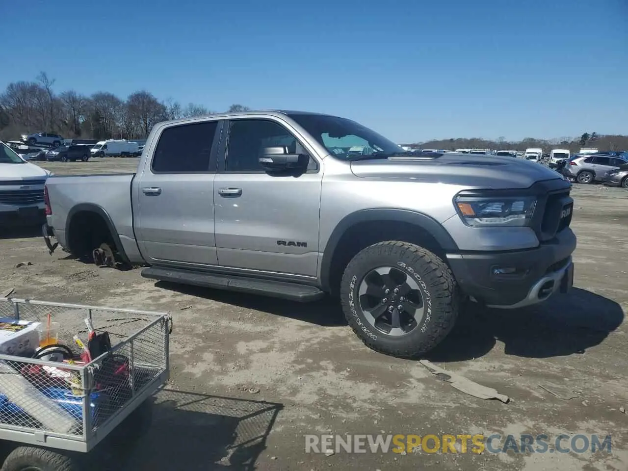 4 Photograph of a damaged car 1C6SRFLT0MN579062 RAM 1500 2021