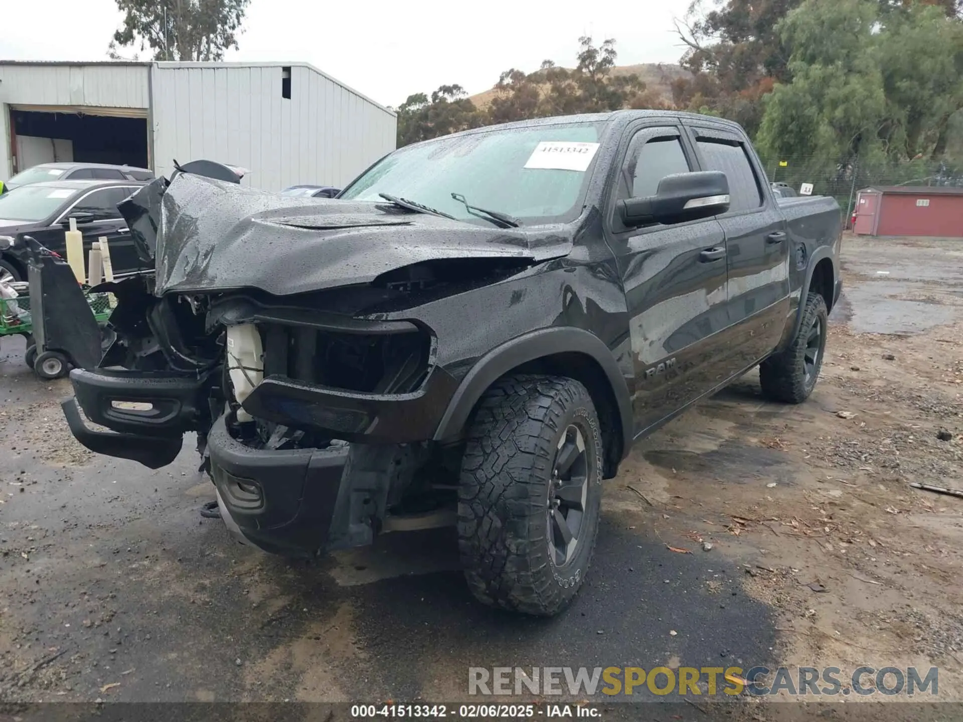 2 Photograph of a damaged car 1C6SRFLT0MN614070 RAM 1500 2021