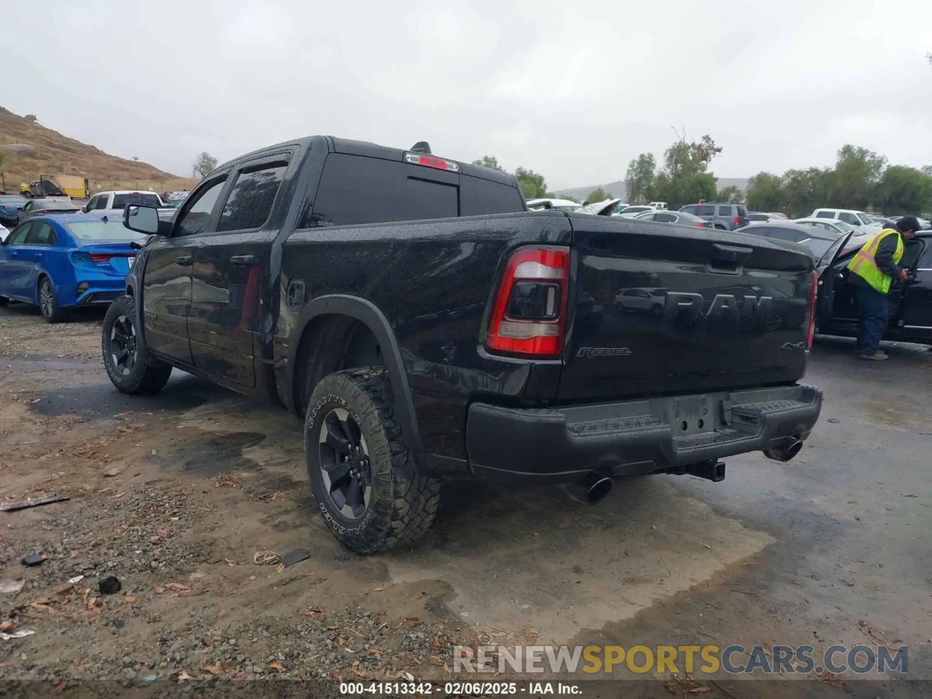 3 Photograph of a damaged car 1C6SRFLT0MN614070 RAM 1500 2021