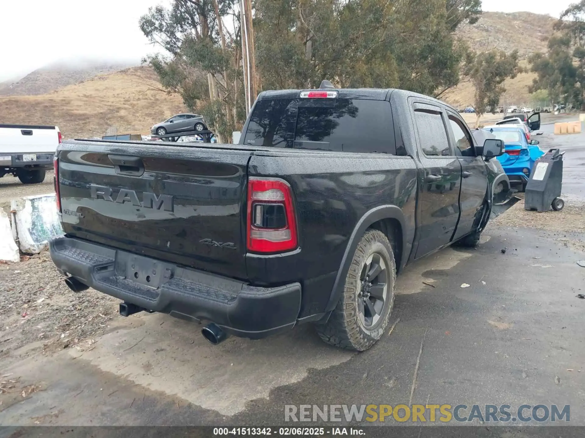 4 Photograph of a damaged car 1C6SRFLT0MN614070 RAM 1500 2021