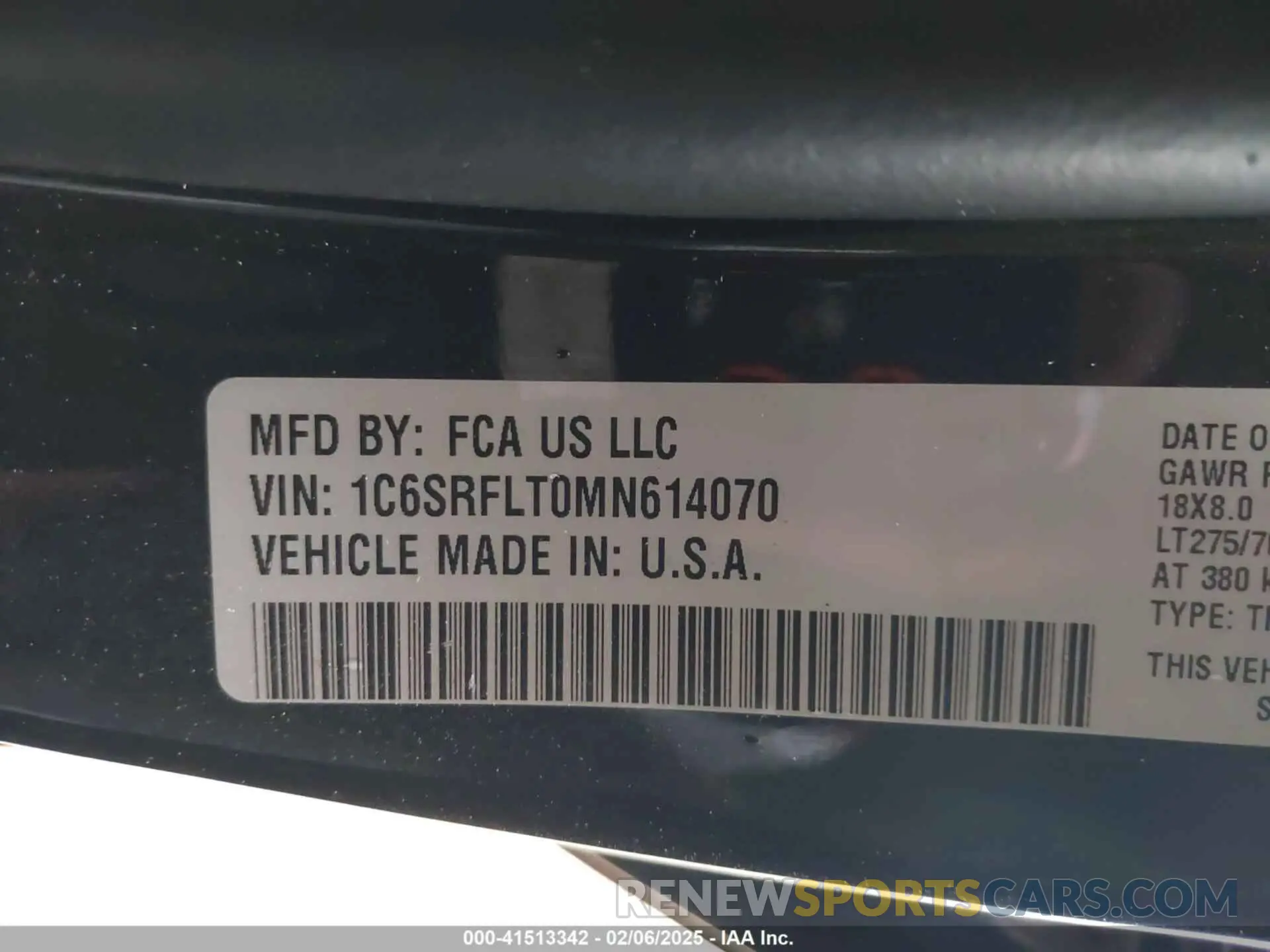 9 Photograph of a damaged car 1C6SRFLT0MN614070 RAM 1500 2021
