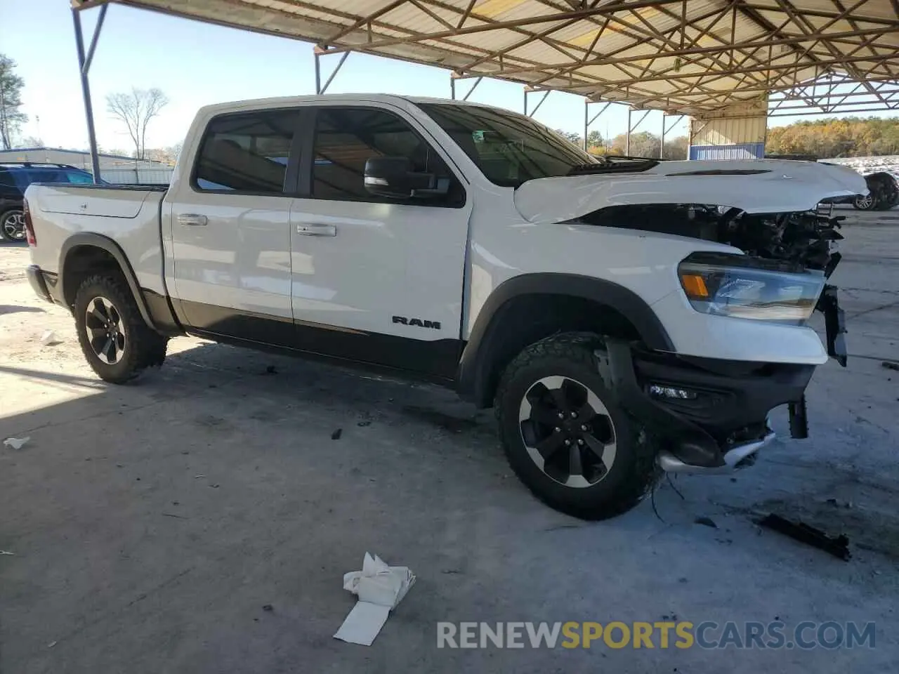 4 Photograph of a damaged car 1C6SRFLT2MN529005 RAM 1500 2021