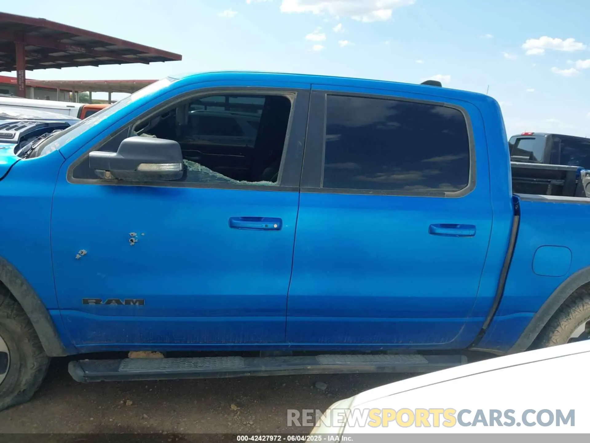 13 Photograph of a damaged car 1C6SRFLT3MN573143 RAM 1500 2021