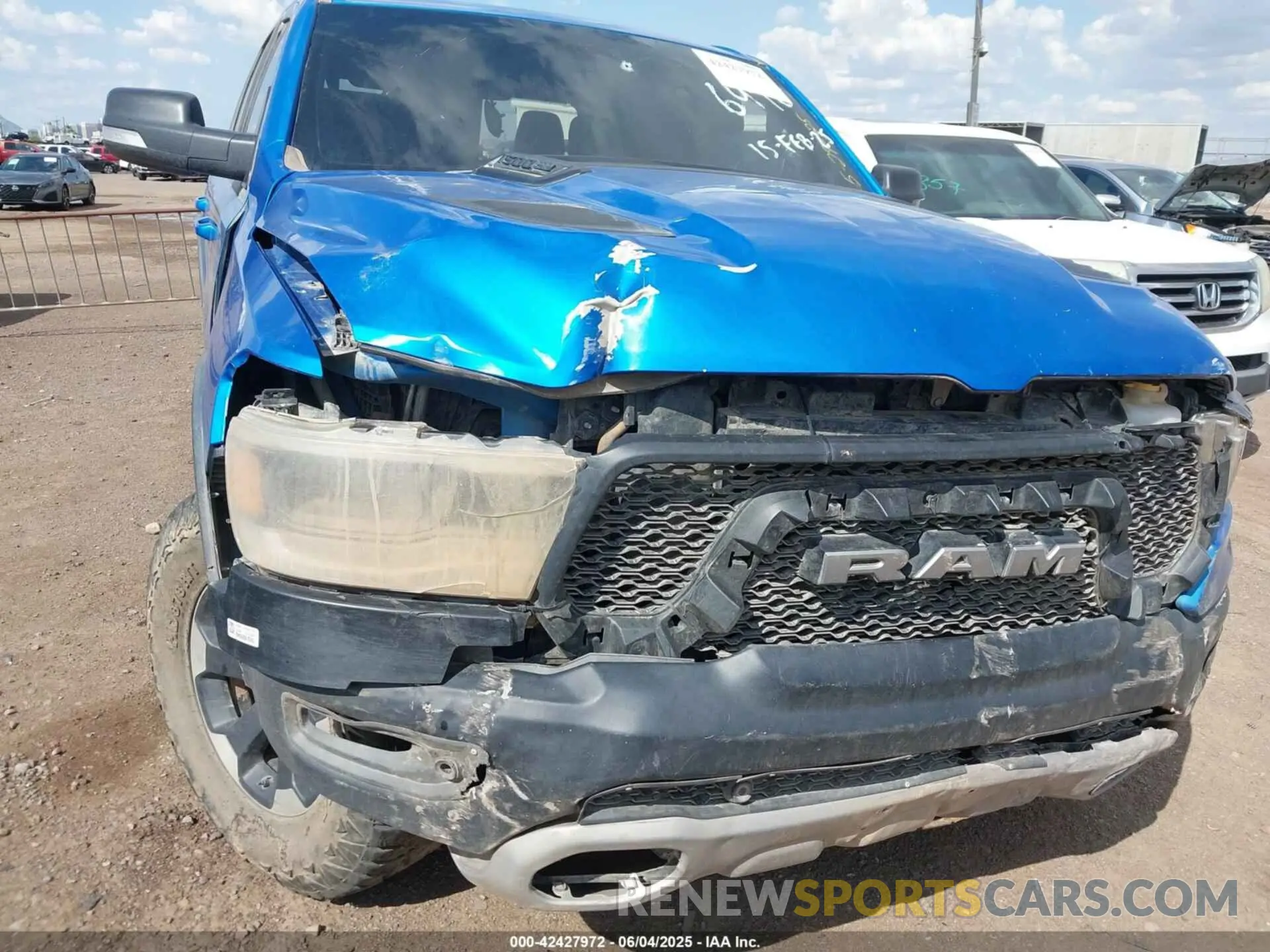 6 Photograph of a damaged car 1C6SRFLT3MN573143 RAM 1500 2021