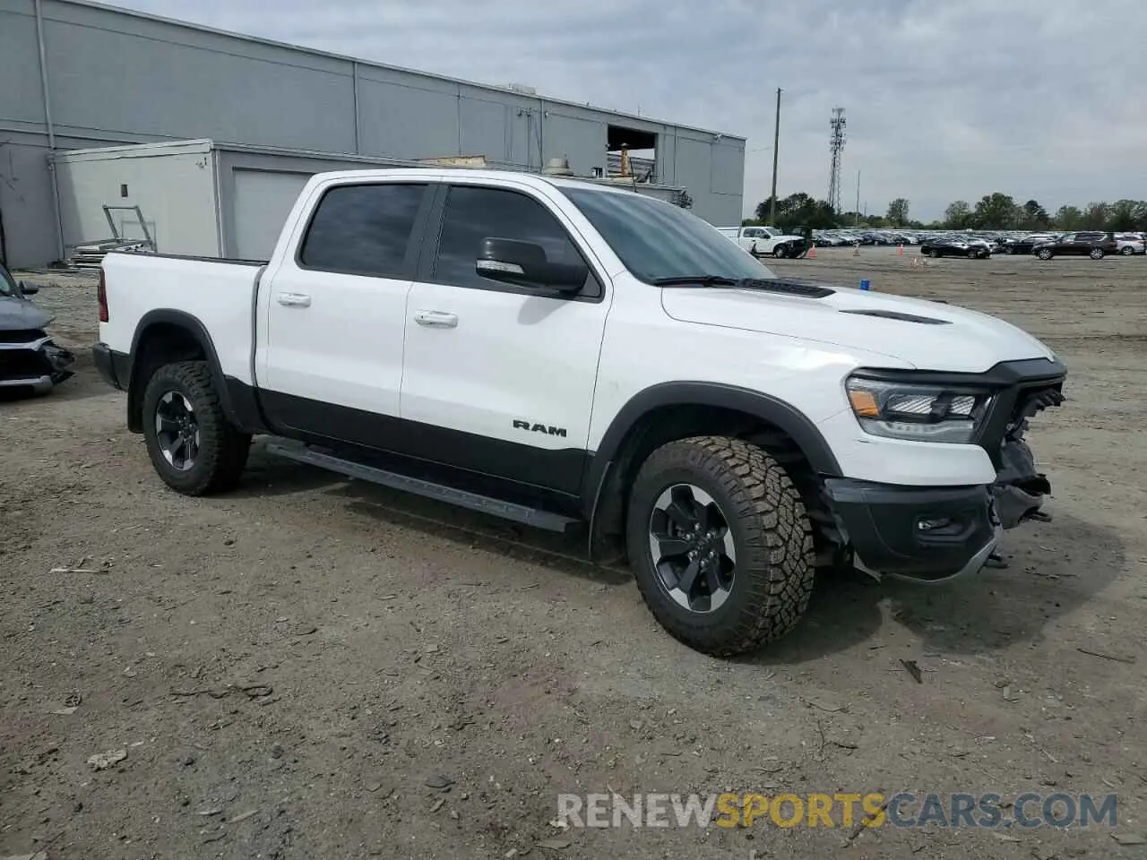 4 Photograph of a damaged car 1C6SRFLT4MN721557 RAM 1500 2021