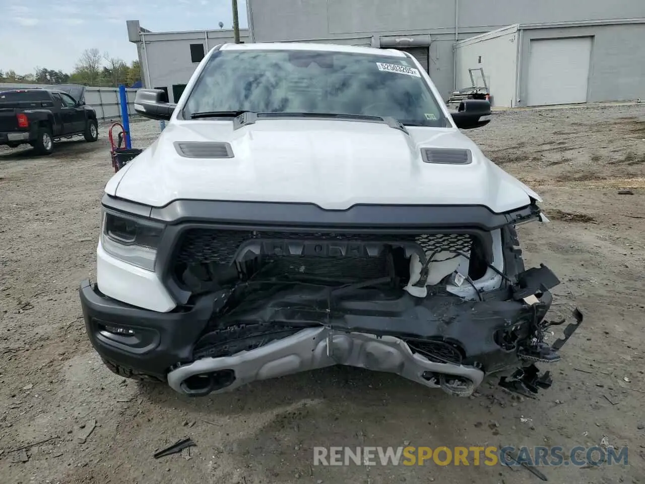 5 Photograph of a damaged car 1C6SRFLT4MN721557 RAM 1500 2021