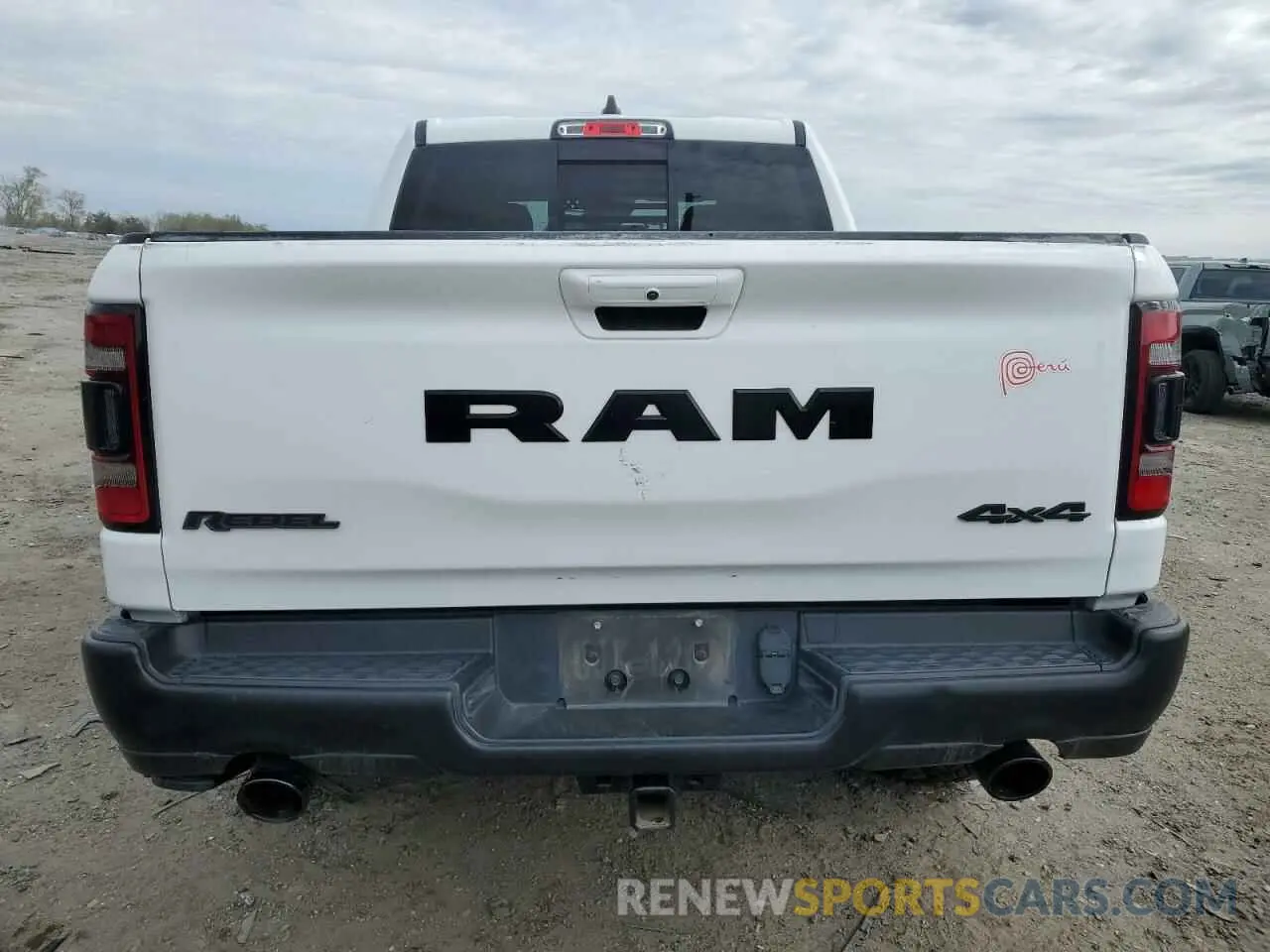 6 Photograph of a damaged car 1C6SRFLT4MN721557 RAM 1500 2021