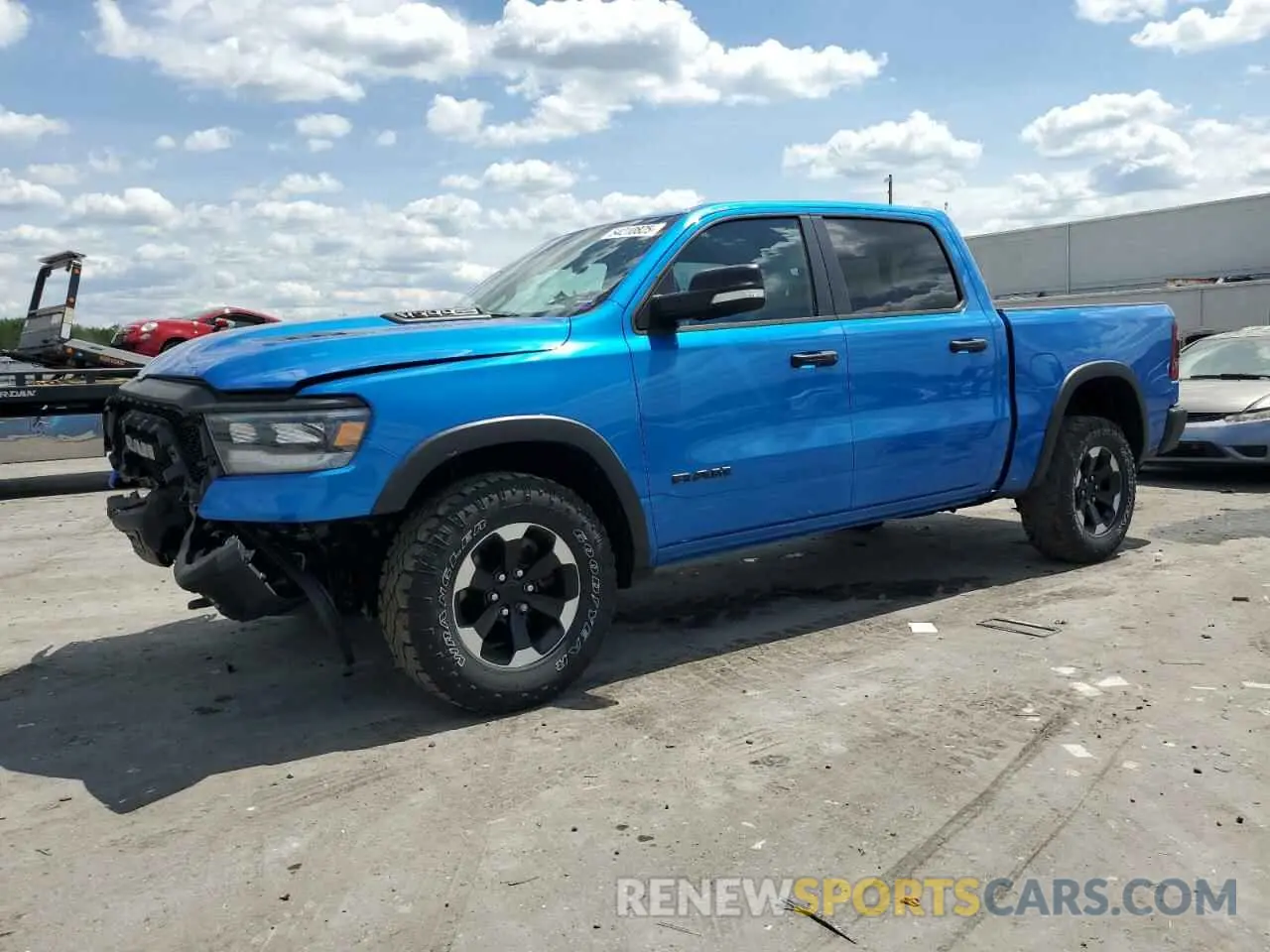 1 Photograph of a damaged car 1C6SRFLT5MN556974 RAM 1500 2021