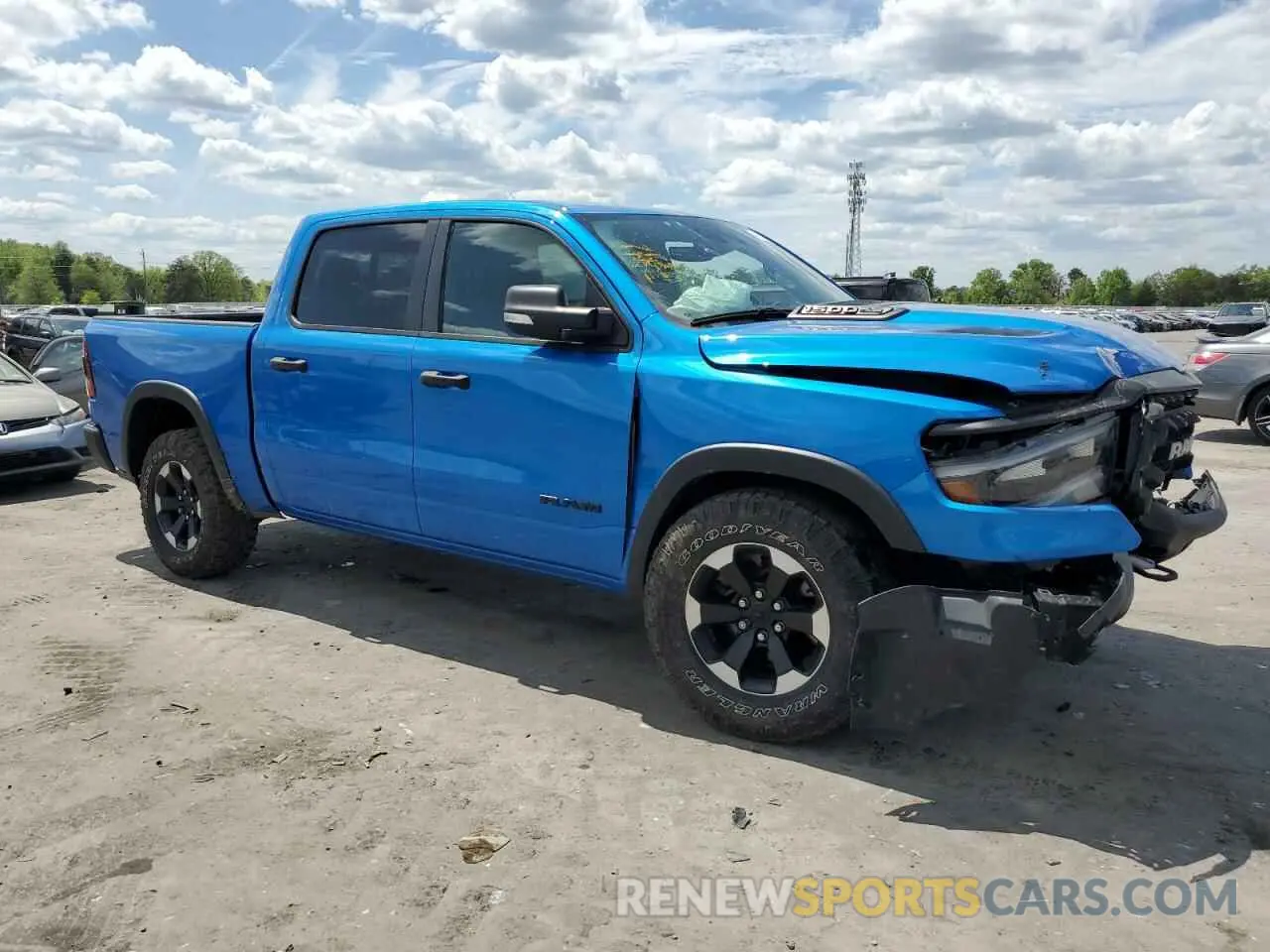 4 Photograph of a damaged car 1C6SRFLT5MN556974 RAM 1500 2021