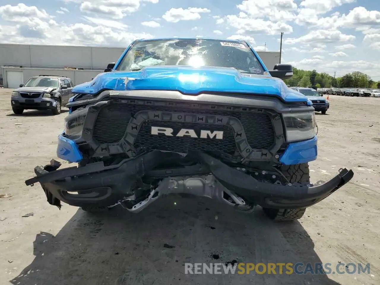 5 Photograph of a damaged car 1C6SRFLT5MN556974 RAM 1500 2021