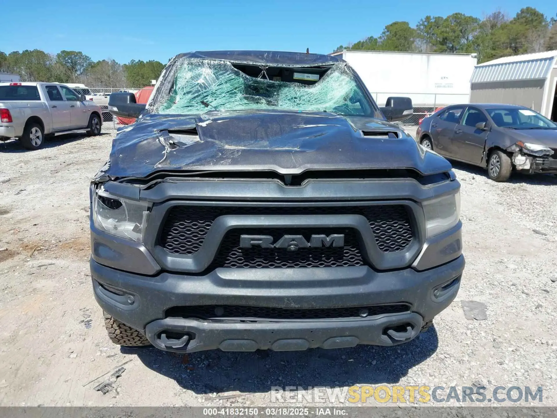 12 Photograph of a damaged car 1C6SRFLT5MN589263 RAM 1500 2021