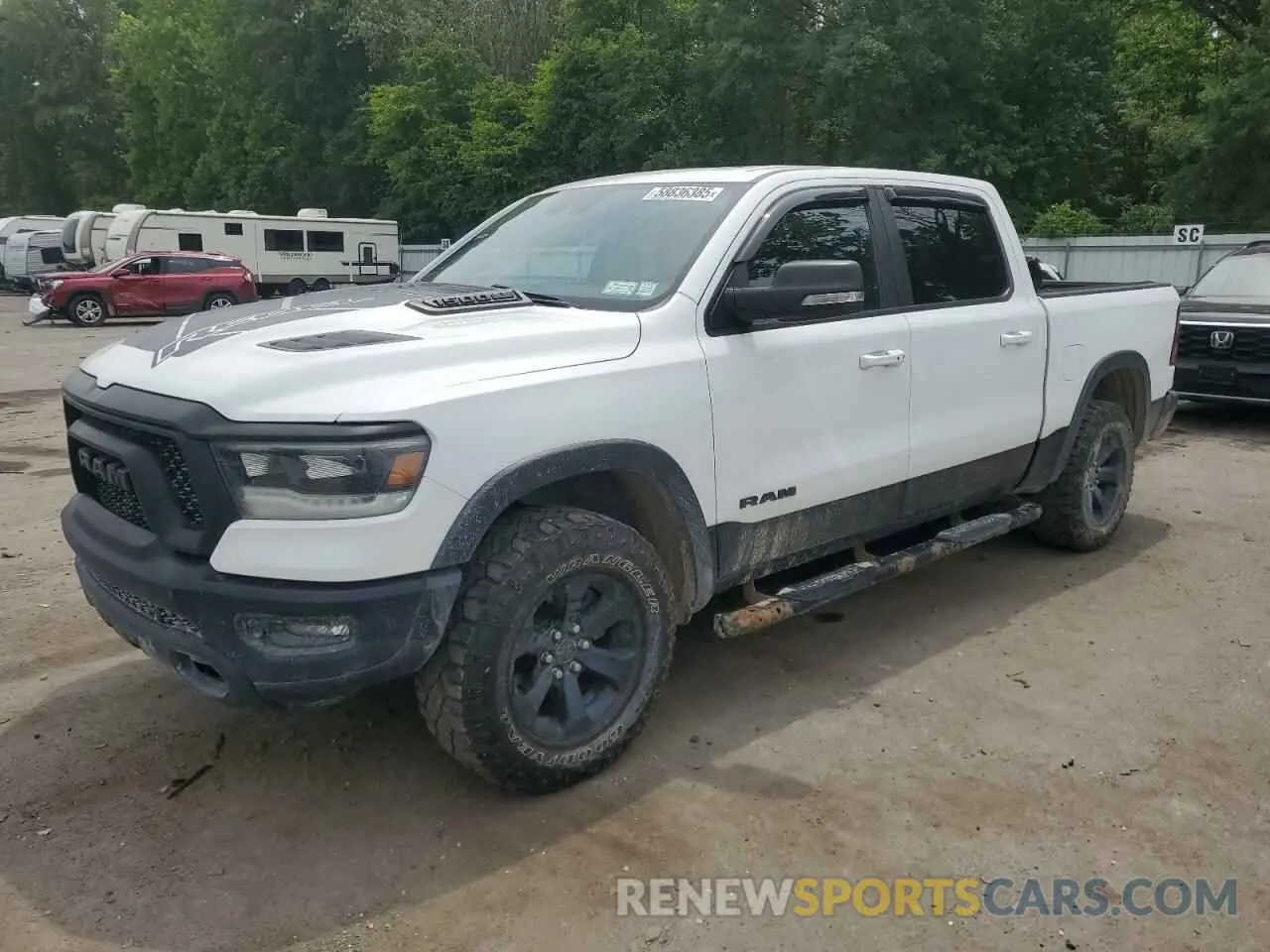 1 Photograph of a damaged car 1C6SRFLT5MN777040 RAM 1500 2021