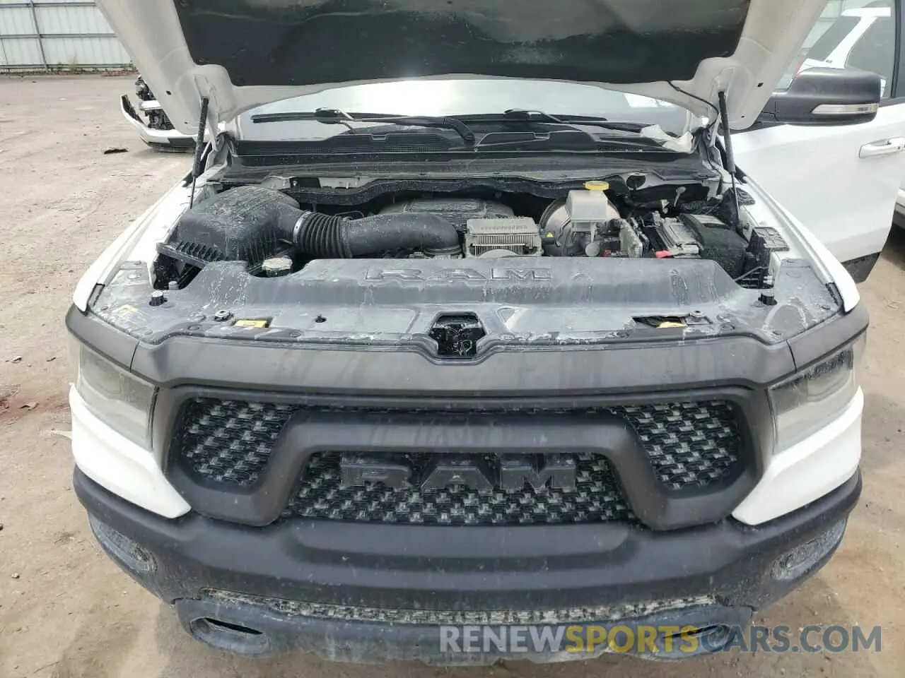 11 Photograph of a damaged car 1C6SRFLT5MN777040 RAM 1500 2021