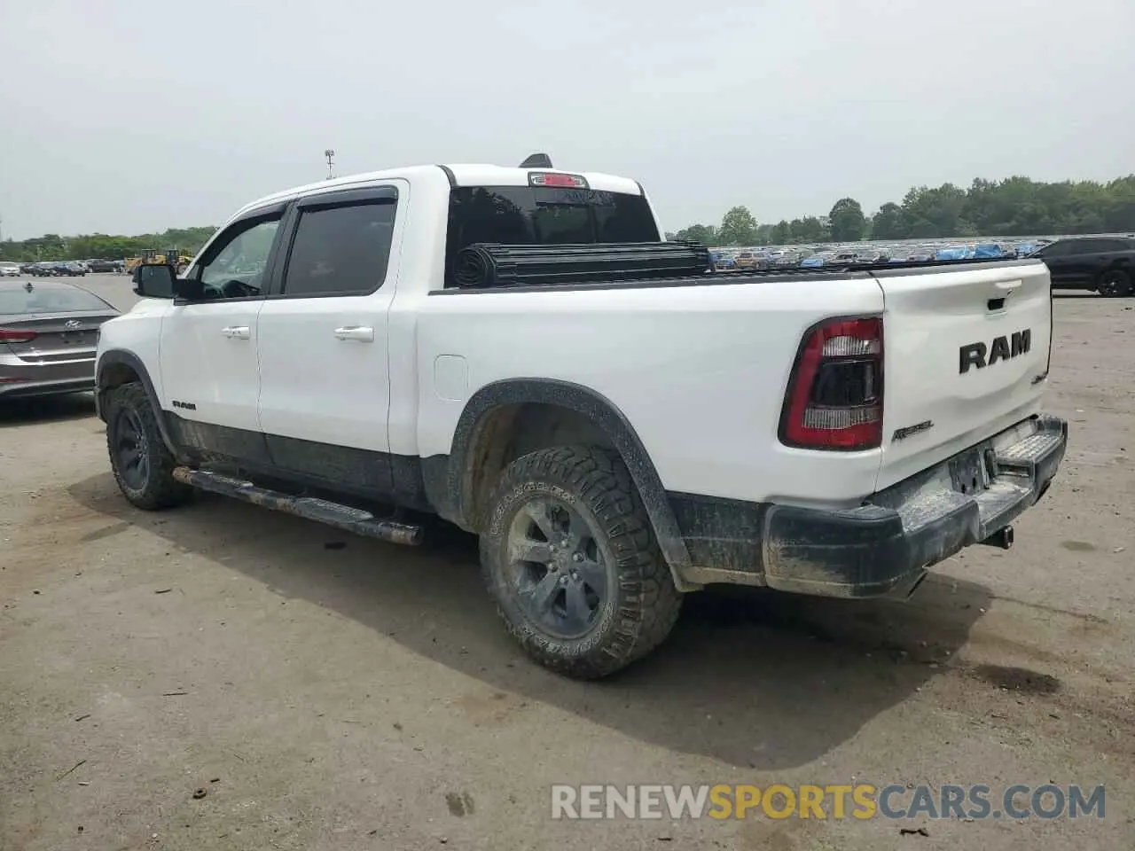 2 Photograph of a damaged car 1C6SRFLT5MN777040 RAM 1500 2021