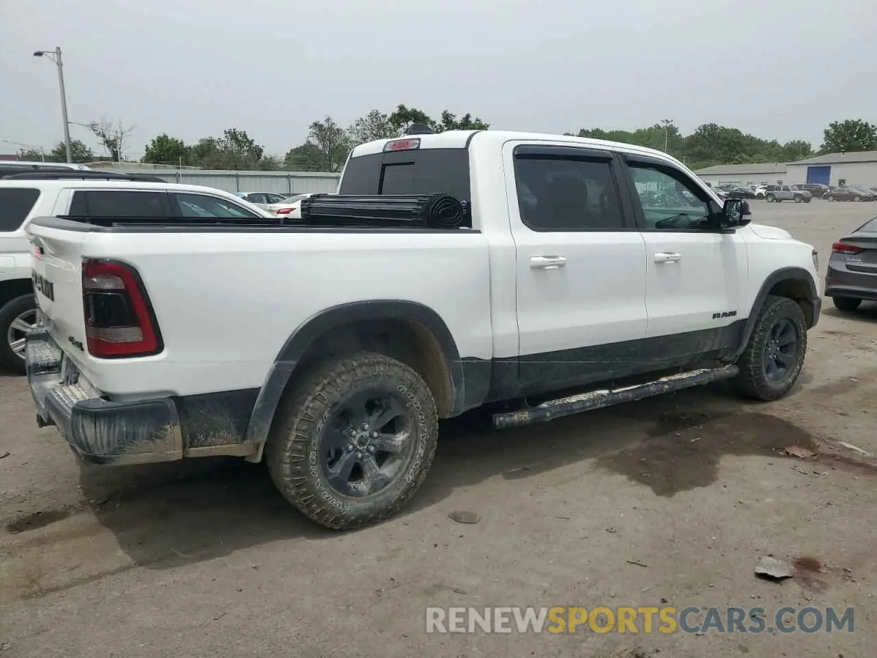 3 Photograph of a damaged car 1C6SRFLT5MN777040 RAM 1500 2021