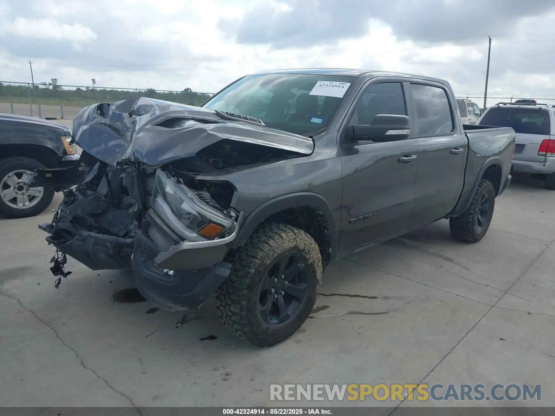 2 Photograph of a damaged car 1C6SRFLT7MN537312 RAM 1500 2021