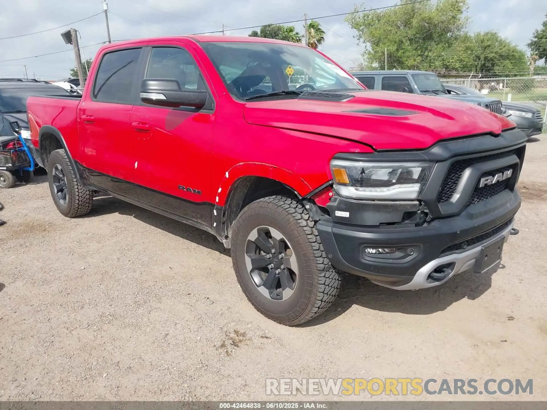 1 Photograph of a damaged car 1C6SRFLT8MN595963 RAM 1500 2021