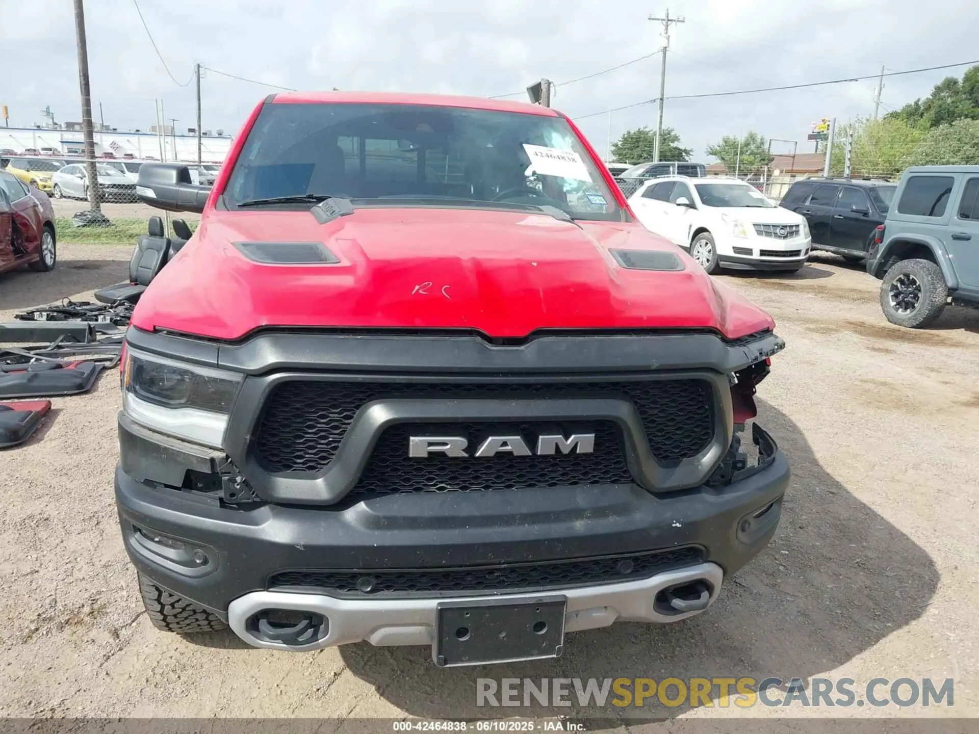 13 Photograph of a damaged car 1C6SRFLT8MN595963 RAM 1500 2021