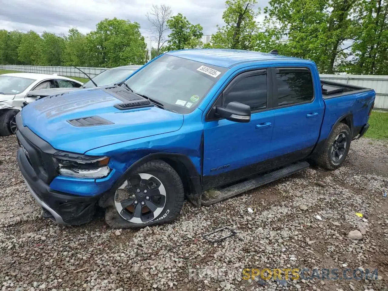 1 Photograph of a damaged car 1C6SRFLT9MN603035 RAM 1500 2021
