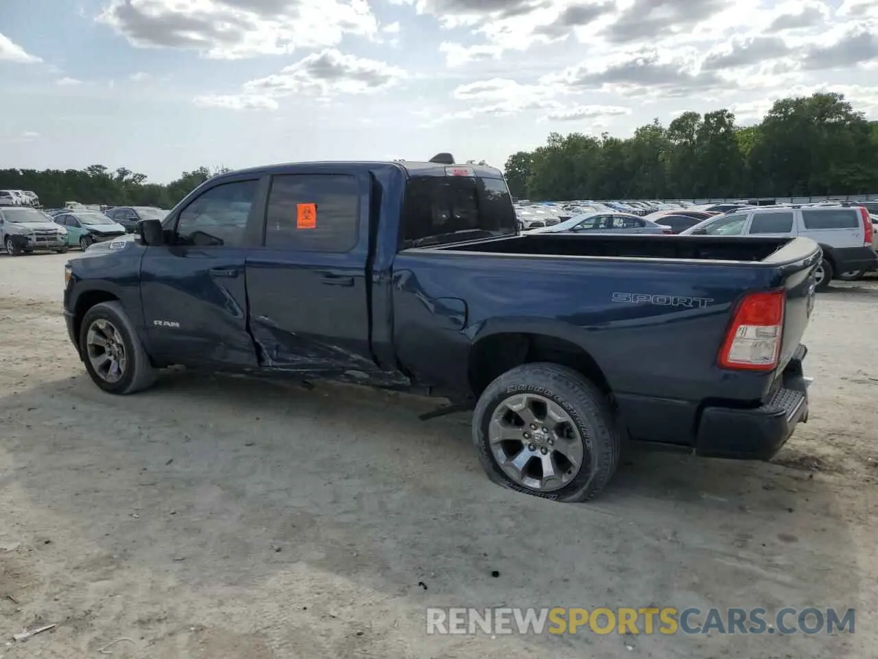 2 Photograph of a damaged car 1C6SRFMT0MN725619 RAM 1500 2021