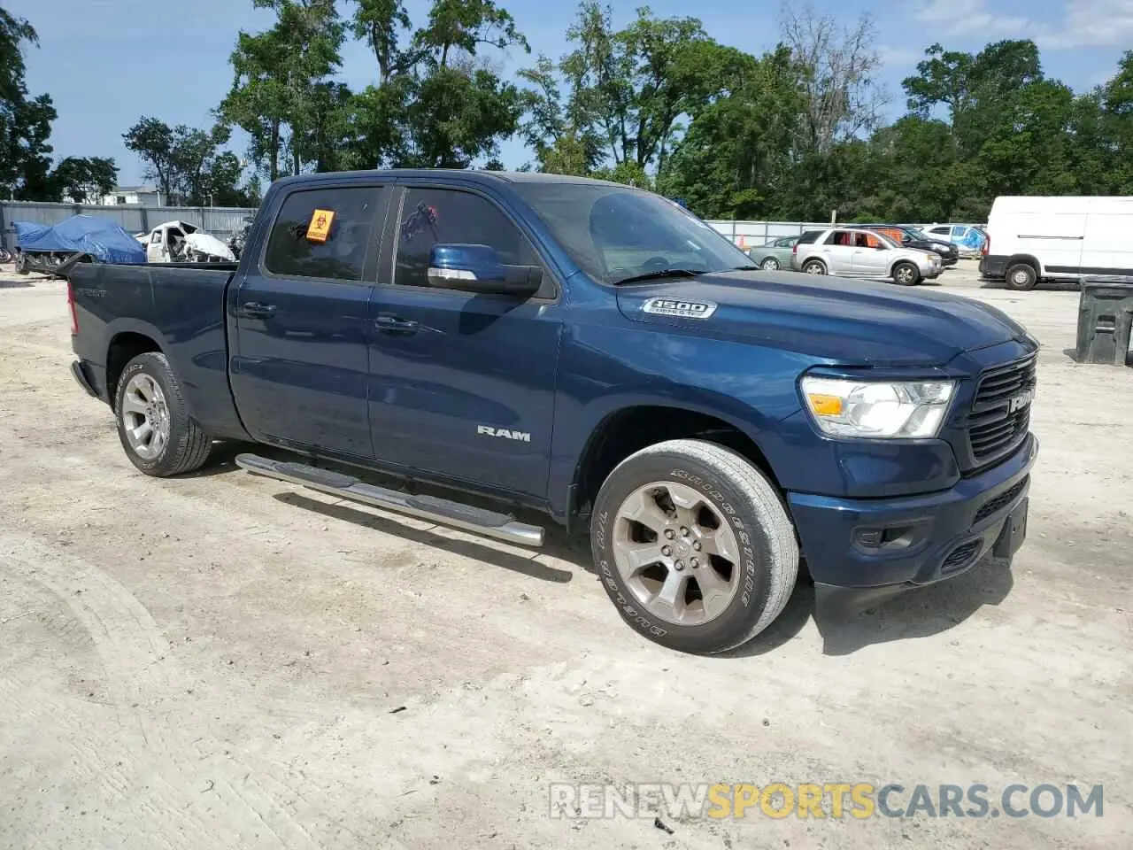 4 Photograph of a damaged car 1C6SRFMT0MN725619 RAM 1500 2021