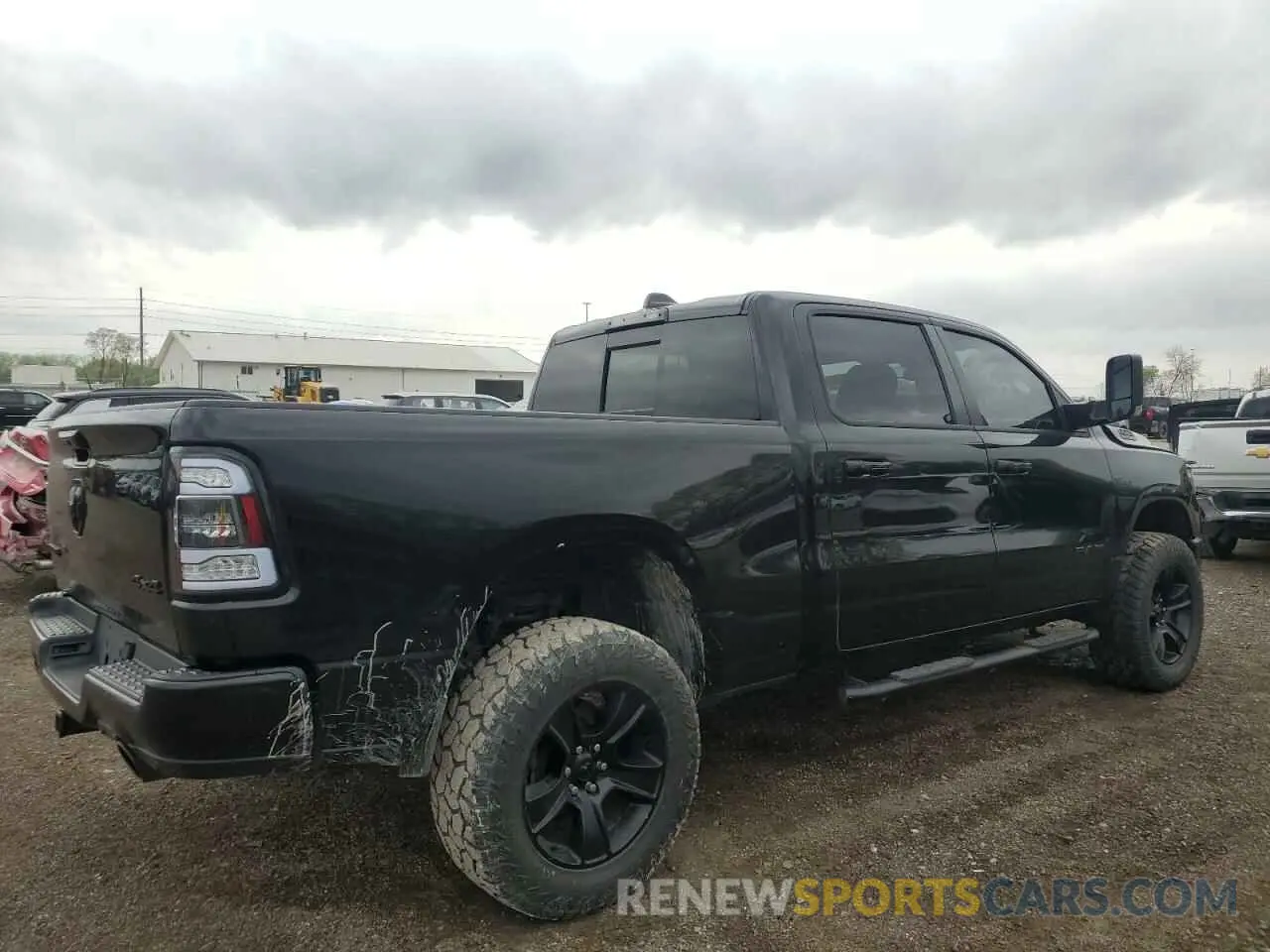 3 Photograph of a damaged car 1C6SRFMT1MN774182 RAM 1500 2021