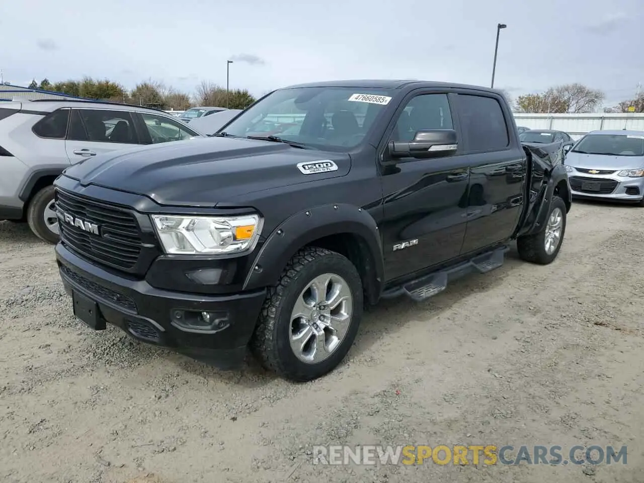 1 Photograph of a damaged car 1C6SRFMT2MN549057 RAM 1500 2021