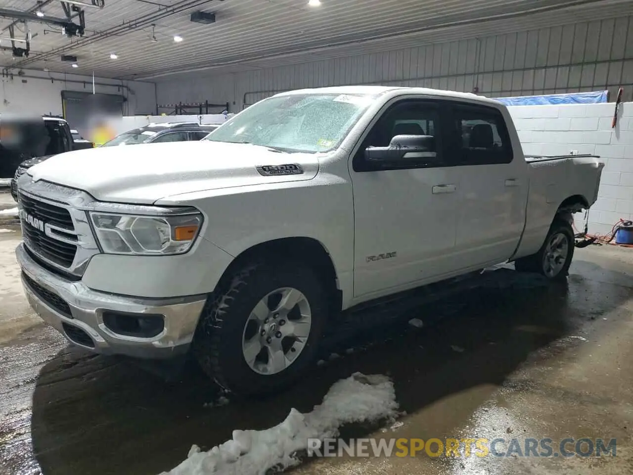1 Photograph of a damaged car 1C6SRFMT2MN619155 RAM 1500 2021