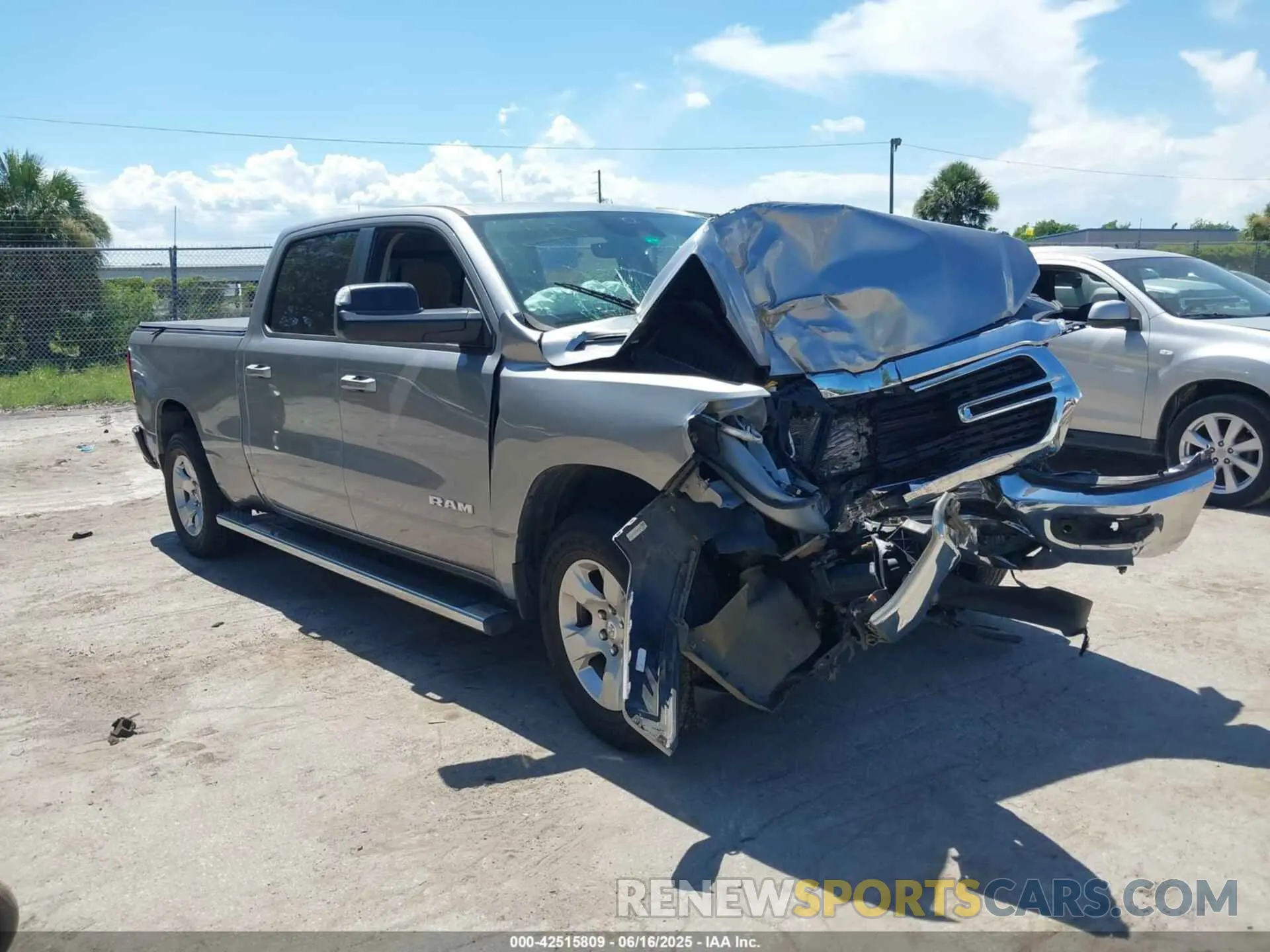 1 Photograph of a damaged car 1C6SRFMT3MN616359 RAM 1500 2021