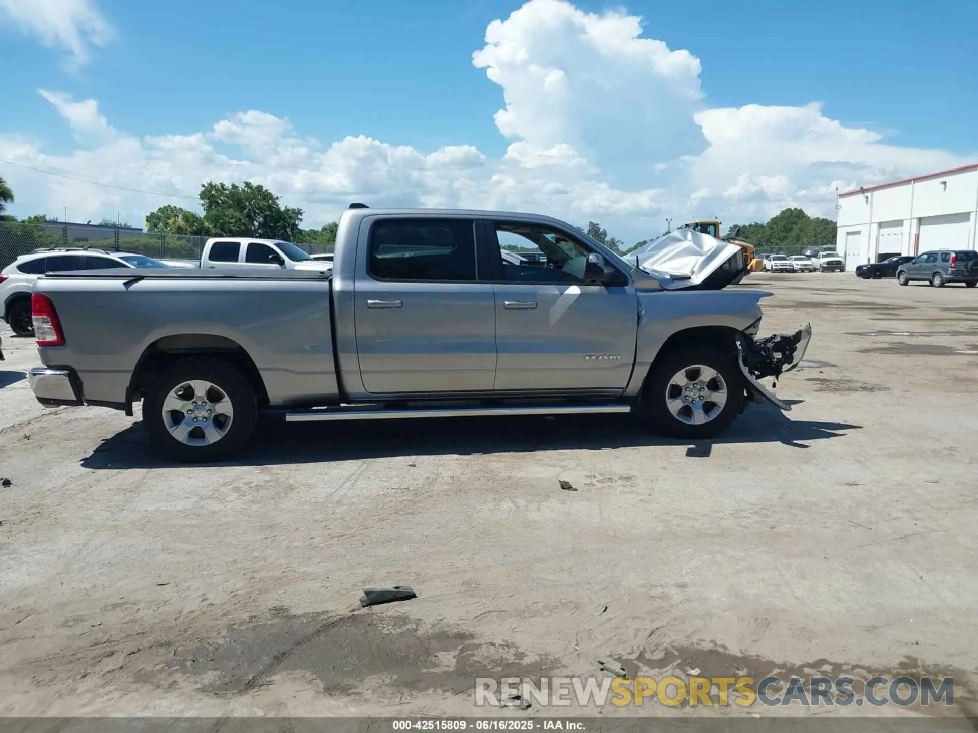 13 Photograph of a damaged car 1C6SRFMT3MN616359 RAM 1500 2021