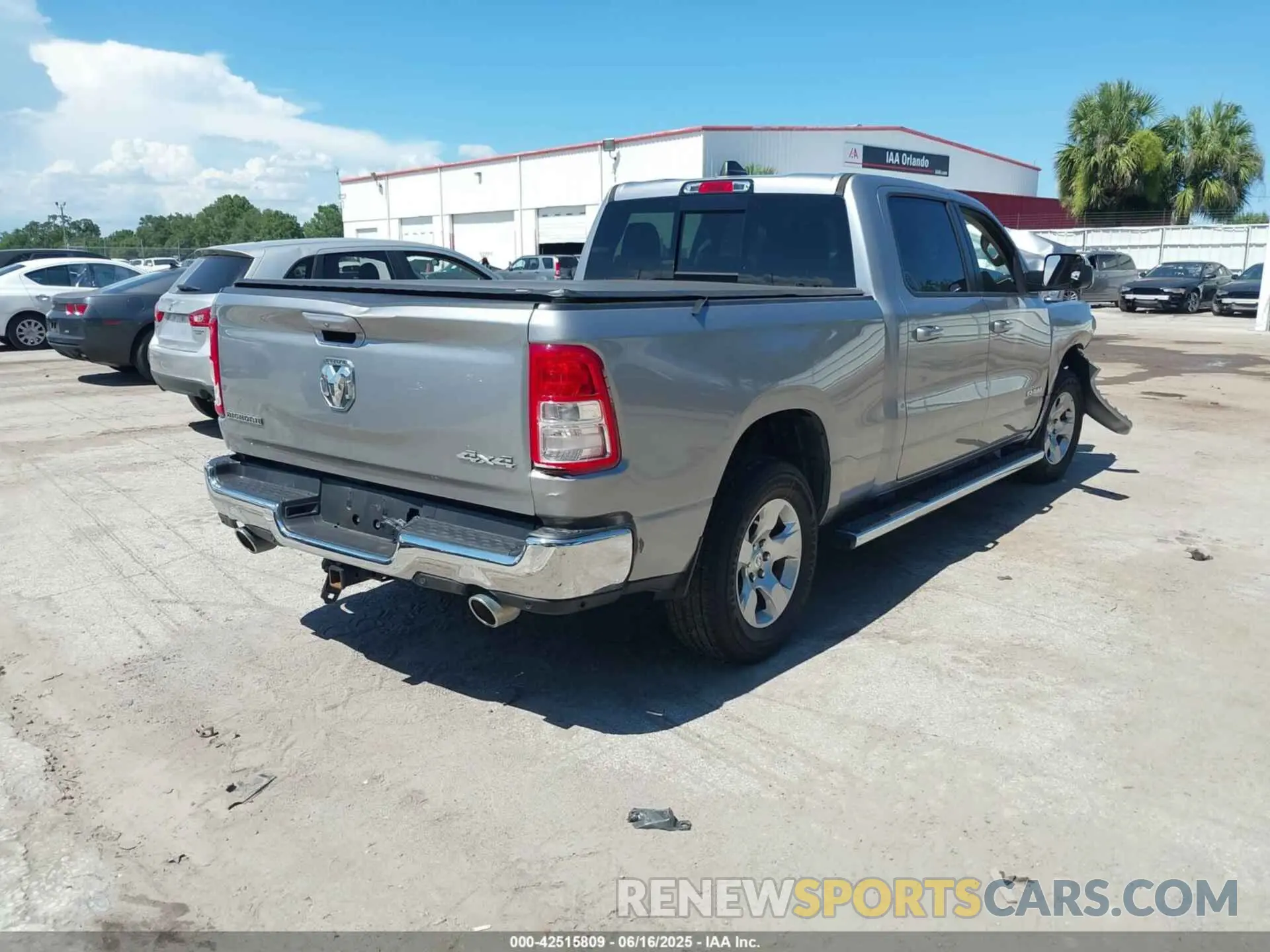 4 Photograph of a damaged car 1C6SRFMT3MN616359 RAM 1500 2021