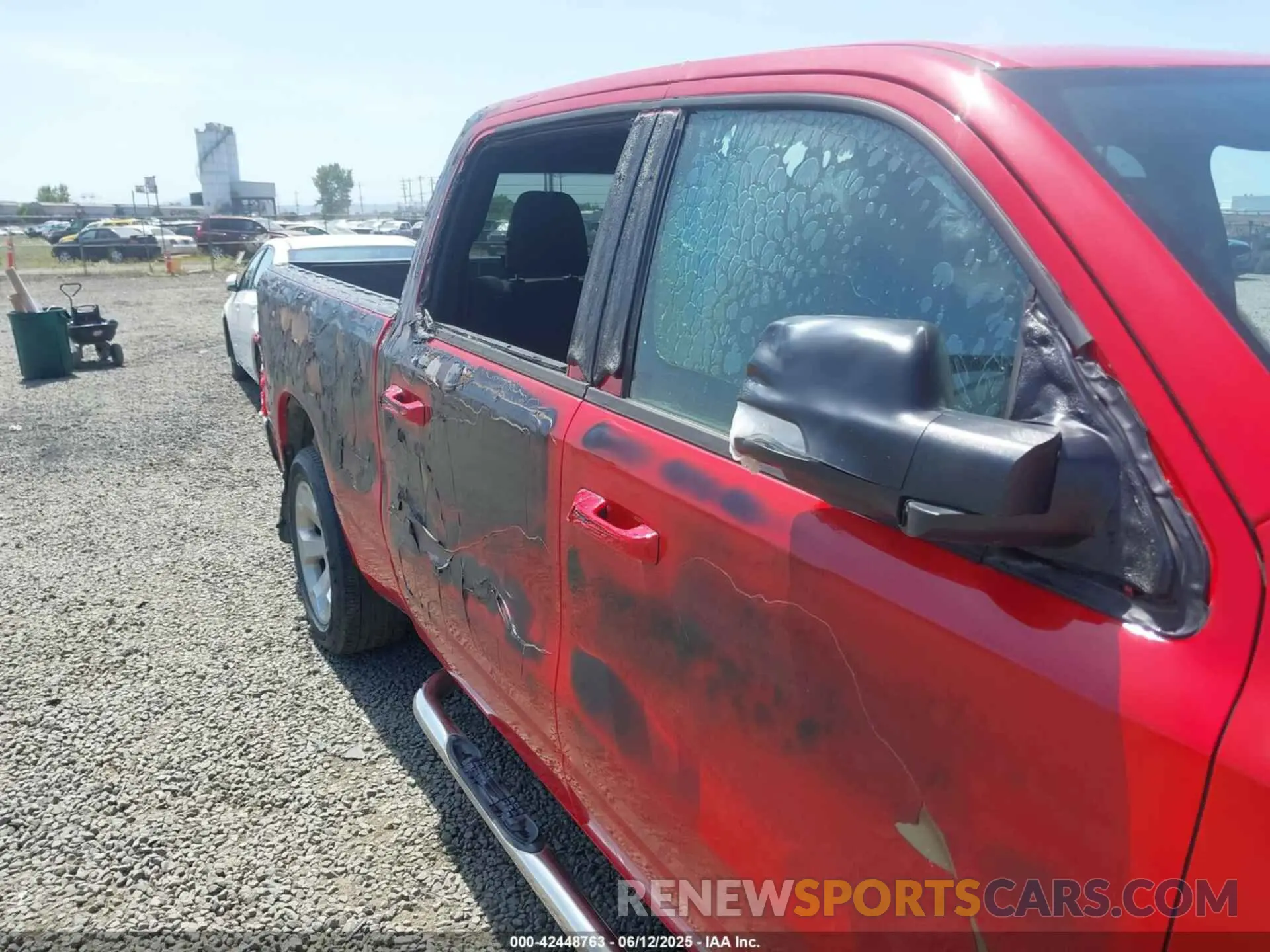 12 Photograph of a damaged car 1C6SRFMT4MN562473 RAM 1500 2021