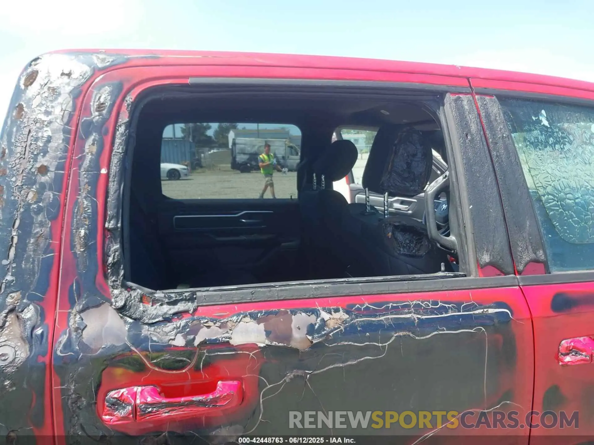 13 Photograph of a damaged car 1C6SRFMT4MN562473 RAM 1500 2021