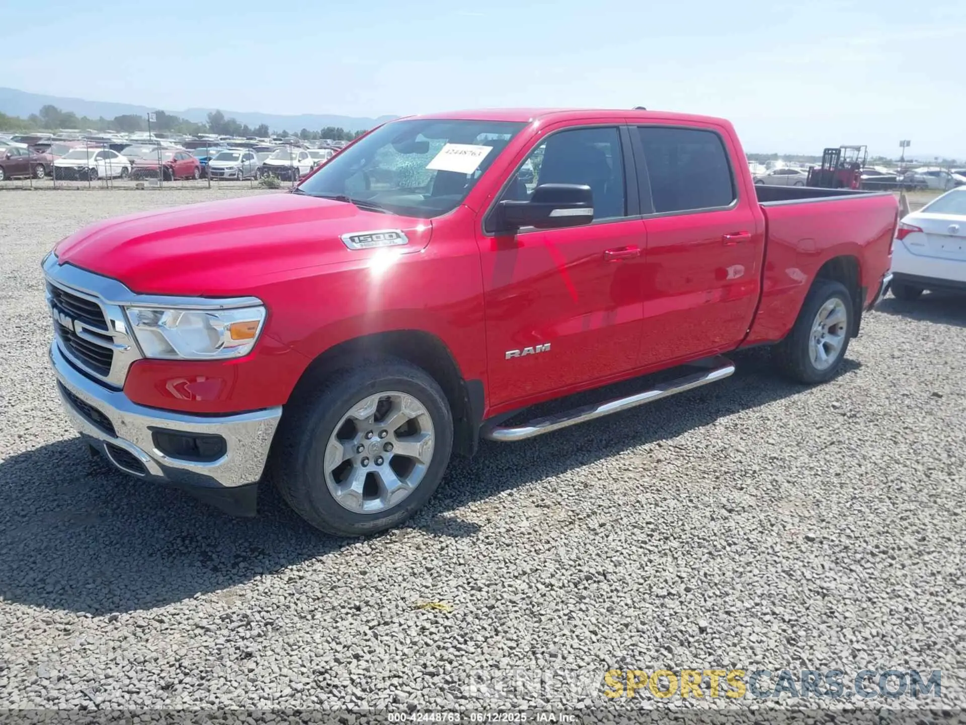 2 Photograph of a damaged car 1C6SRFMT4MN562473 RAM 1500 2021