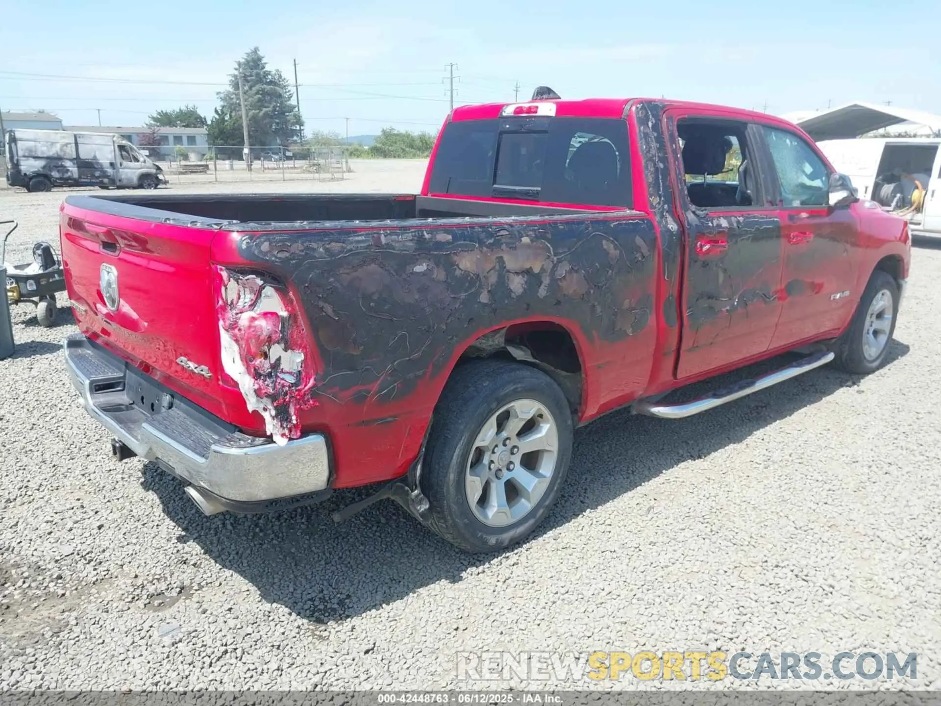 4 Photograph of a damaged car 1C6SRFMT4MN562473 RAM 1500 2021