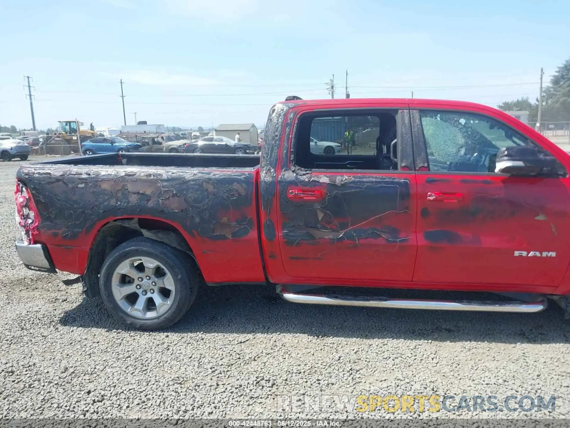 6 Photograph of a damaged car 1C6SRFMT4MN562473 RAM 1500 2021