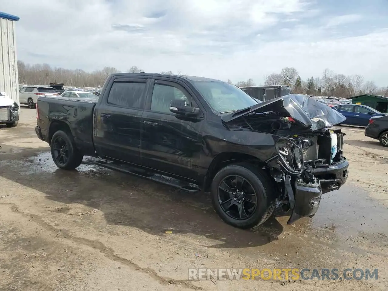 4 Photograph of a damaged car 1C6SRFMT4MN602776 RAM 1500 2021