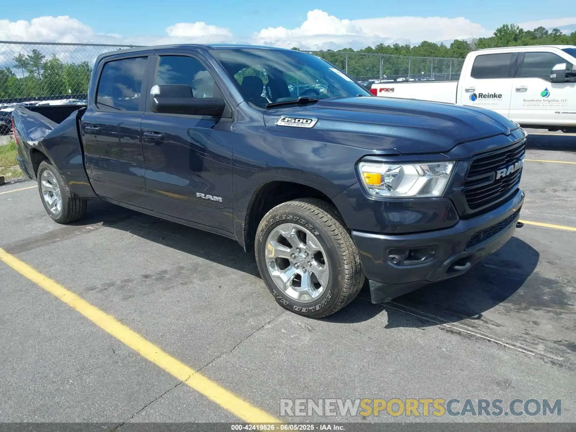 1 Photograph of a damaged car 1C6SRFMT4MN663514 RAM 1500 2021