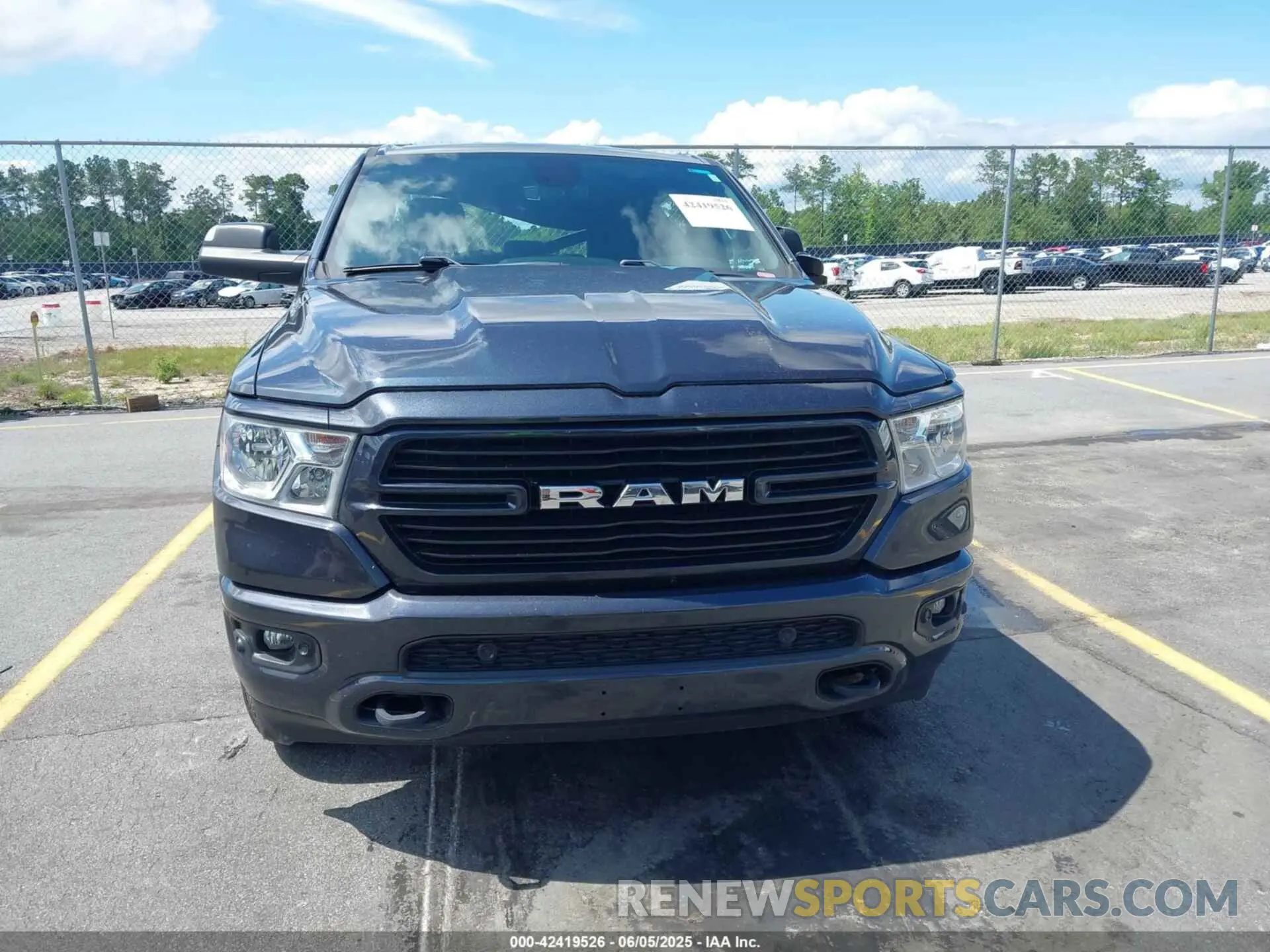 12 Photograph of a damaged car 1C6SRFMT4MN663514 RAM 1500 2021